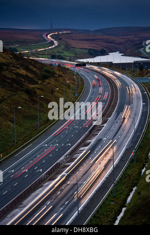 The M62 Motorway looking west from Scammonden Bridge towards Stott Hall Farm and Booth Wood Reservoir. Stock Photo