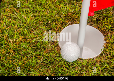 Golf stuff on green grass Stock Photo