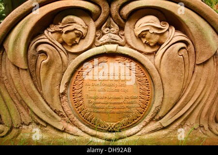 Ornate gravestone at the Watts Mortuary Chapel in the village of Compton near Guildford, Surrey Stock Photo