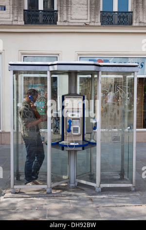 Public Phone Box in Paris, France Stock Photo