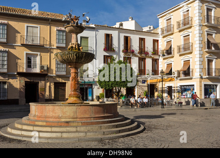 Statue of Pedro Espinosa in the Plaza de Santa Maria with a pavement cafe  and the giants arch to the rear, Antequera, Spain Stock Photo - Alamy