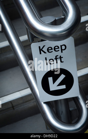 Keep Left sign in railway station Stock Photo