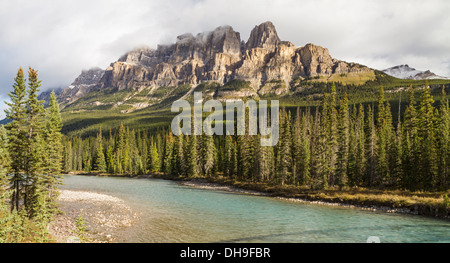 Castle Mountain emerges from the clouds above the Bow River in Banff National Park, Alberta (Panorama) Stock Photo