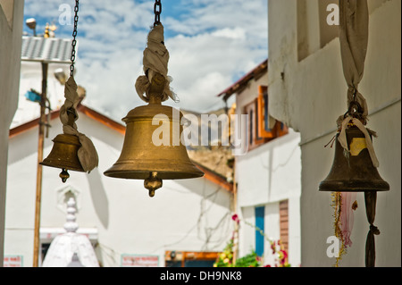 Bronze bells in front of Buddhist Temple. India, Himachal Pradesh Stock Photo