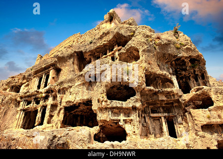 Tlos acropolis and Lycian house and temple-type rock-cut tombs. Tlos Turkey Stock Photo