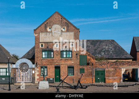 An old warehouse on the Purfleet Quay, King's Lynn, now the offices of Norfolk & Suffolk Probation Trust. Stock Photo