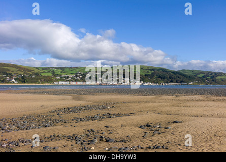 A panoramic view of the coastal holiday town of Aberdovey from directly across the river Dovey on the beach at Ynyslas Stock Photo