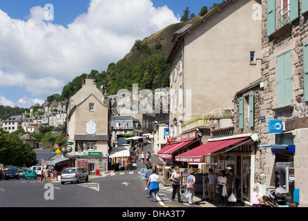 Murat, Cantal, Auvergne, France - 9 Aug 2013: A street scene in the centre of town Stock Photo