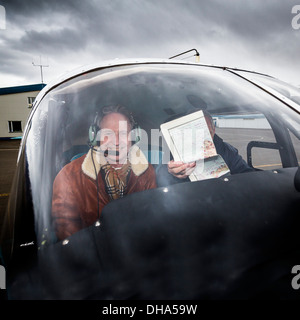 Pilots in a small craft known as the Piper PA-23 Aztec. Stock Photo