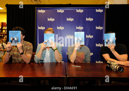 Ben Nemtin Duncan Penn Jonnie Penn and Dave Lingwood cast members of Buried Life appear at Indigo Bookstore promoting new book Stock Photo