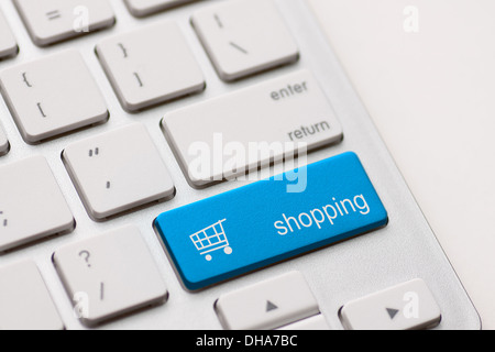 shopping enter button key on white keyboard Stock Photo