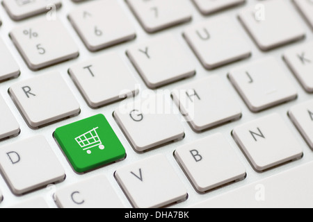 shopping enter button key on white keyboard Stock Photo