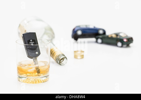 glass of alcohol and car keys. Photo isolated on white background Stock Photo