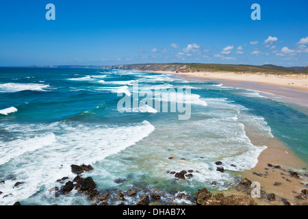 Waves and Bordeira beach from the clifftop at Carrapateira  Costa Vincentina Algarve Portugal EU Europe Stock Photo