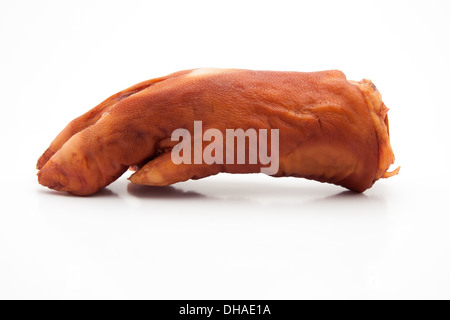 Dry smoked pork  trotters on white background Stock Photo