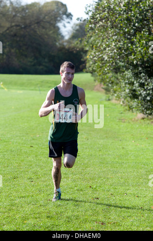 A male student running in the Brose Cross Country Relays at Warwick University, UK Stock Photo