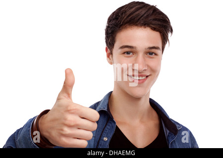 Young man looking ahead and doing ok gesture Stock Photo