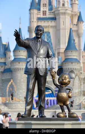 Walt Disney and Mickey Mouse Statue in front of Cinderella Castle at Magic Kingdom, Disney World Resort, Orlando Florida Stock Photo