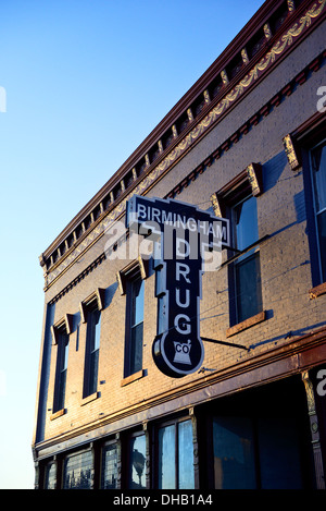 Building and sign for Birmingham Drugs in morning light, Hamlet a small town in central North Carolina. Stock Photo