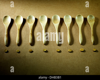 Wood spoons in a row Stock Photo