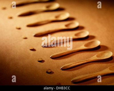 Wood spoons in a row Stock Photo