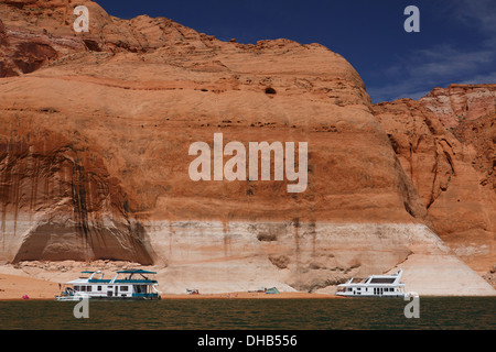 Houseboats in Navajo Canyon, Lake Powell, Glen Canyon National Recreation Area, Page, Arizona. Stock Photo
