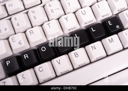 Word Profile written with black keys on computer keyboard. Stock Photo