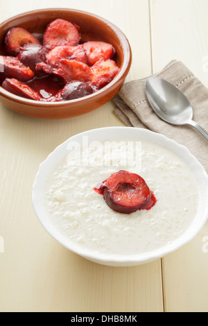 Rice Pudding with plum compote Stock Photo