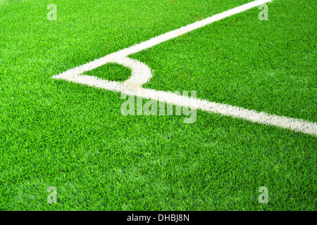 Corner of the football field in green grass. Stock Photo