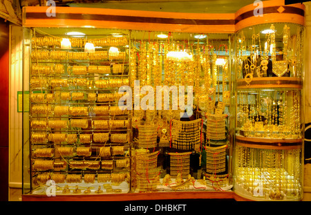 Gold jewelery for sale in shop in Gold Souk in Deira district of Dubai United Arab Emirates