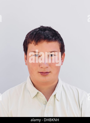 Portrait of a teenage boy with short black hair. Stock Photo