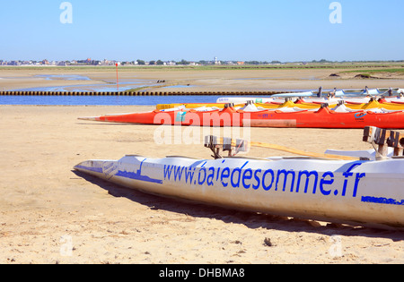 Canoes and kayakes on beach at Baie de la Somme, Quai Jeanne d'Arc, St Valery Sur Somme, Somme, Picardy, France Stock Photo