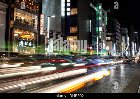 A color photograph of the traffic at night in Tokyo, Japan Stock Photo