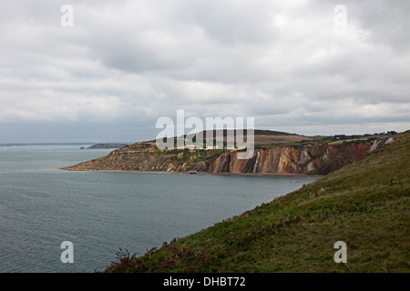 View coloured sand cliffs Alum bay tourism travel land sea scape Alum bay Isle of Wight Hampshire England Stock Photo