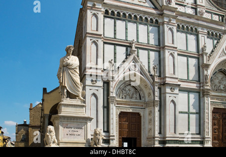 The neo-gothic facade of Basilica di Santa Croce and Dante Alighieri memorial statue. Florence, Italy Stock Photo