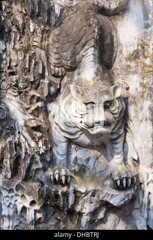 old tiger statue in the temple Stock Photo