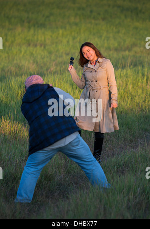 Taking pictures, Midnight sun, Grotta, Reykjavik, Iceland Stock Photo