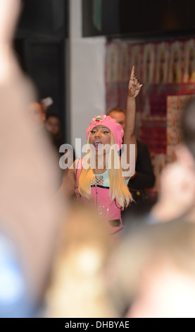 Nicki Minaj signs copies of her new album 'Pink Friday: Roman Reloaded' at HMV London England - 19.04.12 Stock Photo