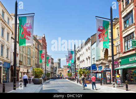 High street UK high street people in Cardiff city centre walking up High Street towards the castle South Glamorgan South Wales UK GB Europe Stock Photo