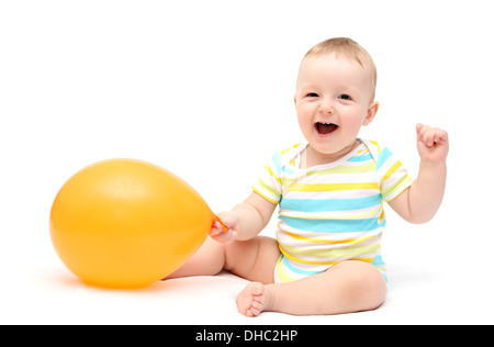 Happy baby with balloon Stock Photo