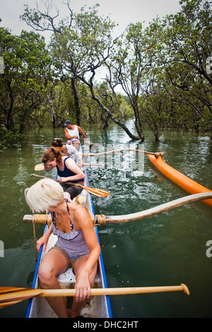 Paddling On A Waka With A Maori Guide In The Bay Of Islands; New Zealand Stock Photo