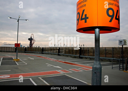 car park at Westfield Stratford City in the shadow of the Olympic Park The ArcelorMittal Orbit is in the background Stock Photo