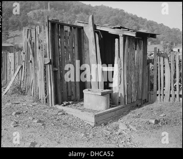 Privies. The privy with some siding is still used. Kentucky Straight Creek Coal Company, Belva Mine, abandoned after... 541203 Stock Photo