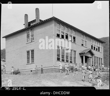 The grade school which is used by several coal camps in this vicinity. It was built with WPA funds. Lejunior, Harlan... 541393 Stock Photo