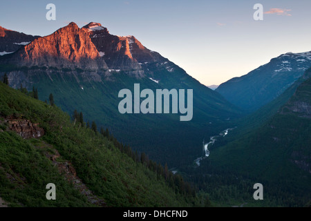 Evening light on Mount Oberlin and Canon Mountain above McDonald Creek in Glacier National Park, Montana. Stock Photo