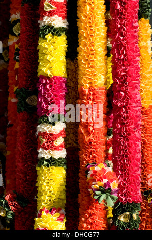 Multi coloured paper garlands used in religious ceremonies and Temples and homes all over India and the world. Stock Photo