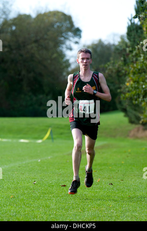 A male student running in the Brose Cross Country Relays at Warwick University, UK Stock Photo