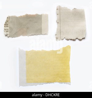 Three pieces of torn paper isolated on plain background Stock Photo