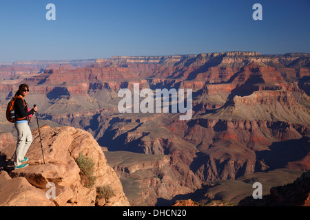 Hiker at Ooh-ahh Point on the South Kaibab Trail, Grand Canyon National Park, Arizona. (Model Released) Stock Photo