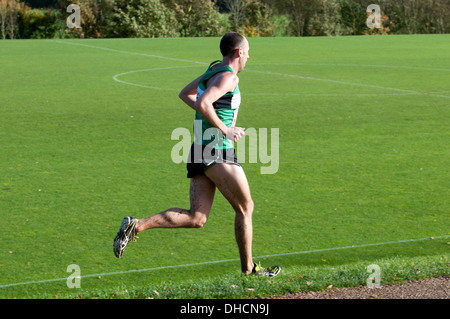 A club runner running in The Brose Cross Country Relays at Warwick University, UK Stock Photo